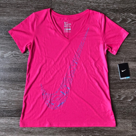 pink and turquoise nike shirt